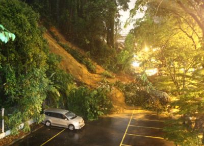 A landslide buried nine cars at a car park along Jalan Ampang - The Star